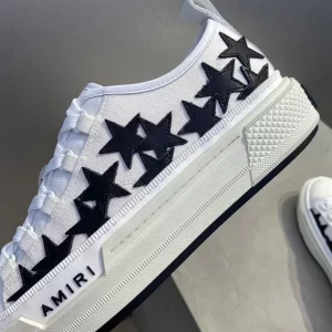 AMIRI STAR-PATCH LOW-TOP SNEAKERS - AM011