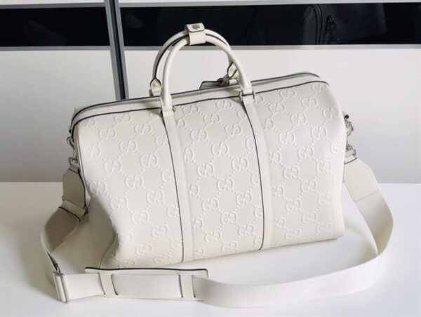 GUCCI GG EMBOSSED DUFFLE BAG - GC59