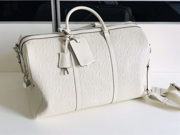 GUCCI GG EMBOSSED DUFFLE BAG - GC59