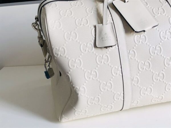 GUCCI GG EMBOSSED DUFFLE BAG - GC59